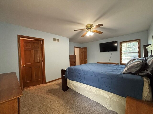 2006 Buckingham St, Saint Joseph, MO 64506 - carpeted bedroom featuring ceiling fan and baseboards
