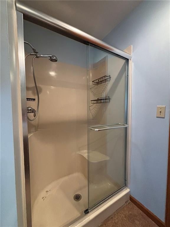 2006 Buckingham St, Saint Joseph, MO 64506 - bathroom with a shower stall and baseboards