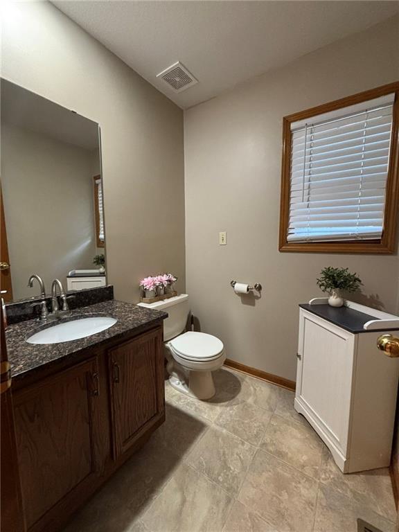 2006 Buckingham St, Saint Joseph, MO 64506 - bathroom featuring vanity and tile patterned floors