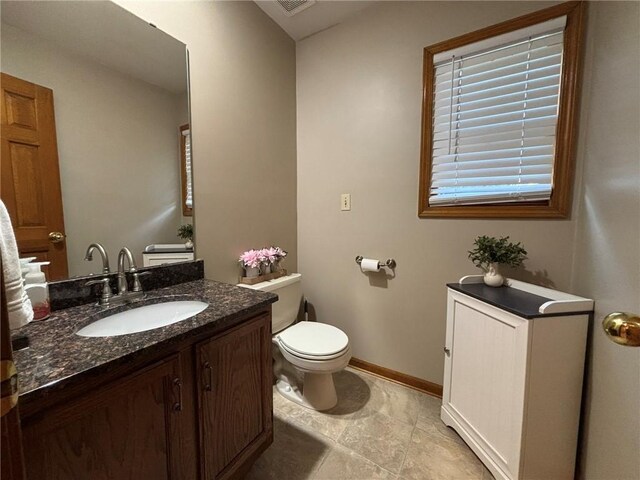 2006 Buckingham St, Saint Joseph, MO 64506 - bathroom with vanity and tile patterned floors