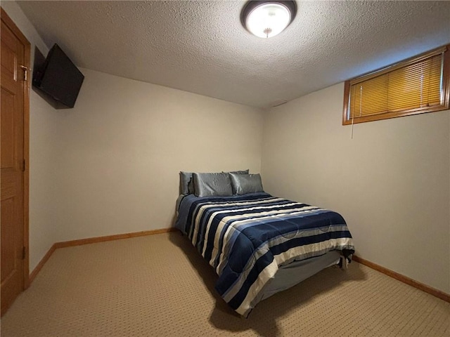2006 Buckingham St, Saint Joseph, MO 64506 - carpeted bedroom featuring baseboards and a textured ceiling