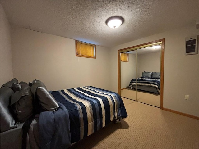 2006 Buckingham St, Saint Joseph, MO 64506 - bedroom with carpet flooring, a closet, and a textured ceiling