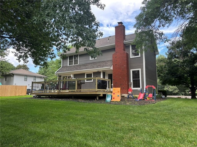 2006 Buckingham St, Saint Joseph, MO 64506 - rear view of property with a deck and a chimney