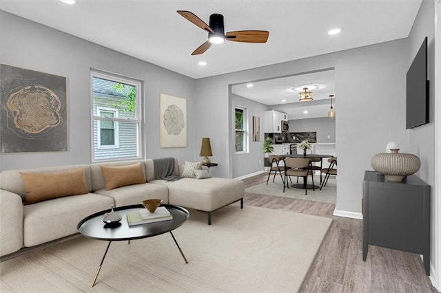 804 S Cedar Ave, Independence, MO 64053 - living room with wood finished floors, recessed lighting, and a ceiling fan