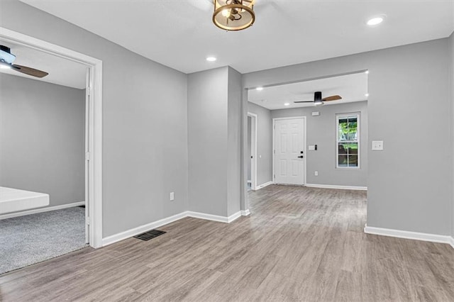 804 S Cedar Ave, Independence, MO 64053 - foyer with a ceiling fan, wood finished floors, and recessed lighting