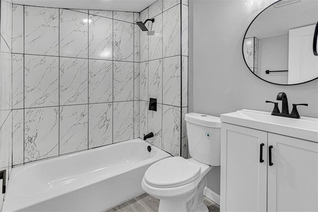 804 S Cedar Ave, Independence, MO 64053 - full bathroom with vanity, tub / shower combination, and wood finished floors