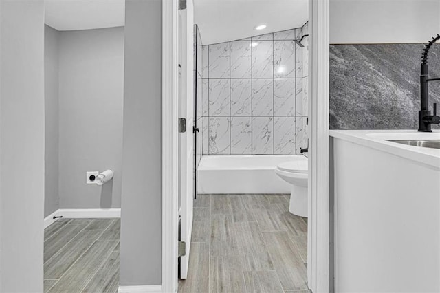804 S Cedar Ave, Independence, MO 64053 - full bath featuring  shower combination, wood finish floors, and vanity