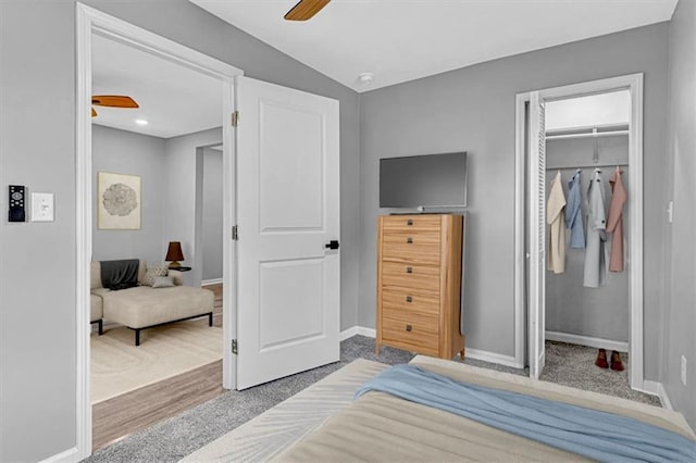 804 S Cedar Ave, Independence, MO 64053 - carpeted bedroom featuring a walk in closet and ceiling fan