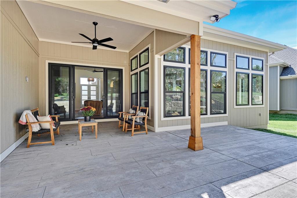 9845 Shady Bend Rd, Lenexa, KS 66227 - view of patio featuring ceiling fan