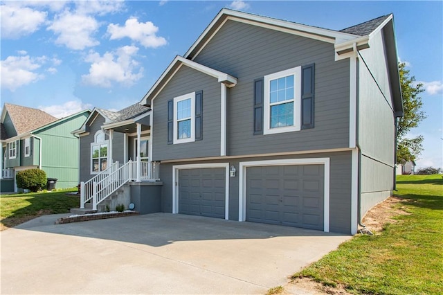 2105 NW Sweetgum Ct, Grain Valley, MO 64029 - view of front of house featuring driveway, an attached garage, and a front yard