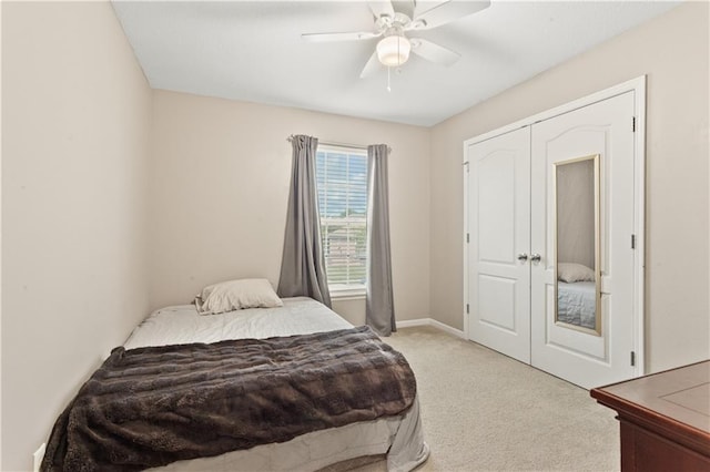 2105 NW Sweetgum Ct, Grain Valley, MO 64029 - bedroom with carpet, ceiling fan, and a closet