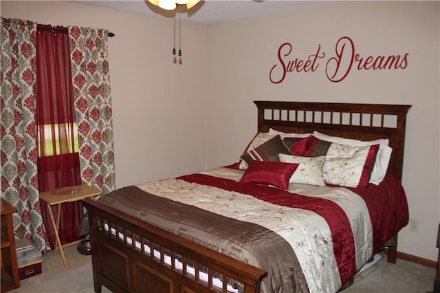 612 N 4th St, Arma, KS 66712 - bedroom featuring carpet floors and ceiling fan