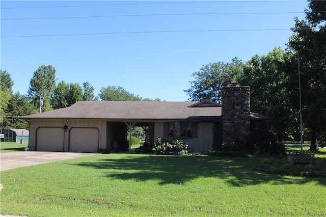 612 N 4th St, Arma, KS 66712 - ranch-style home with a garage, a chimney, driveway, and a front yard