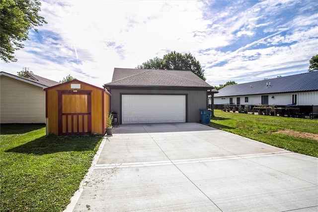 311 S 3rd St, Odessa, MO 64076 - garage with a shed and driveway