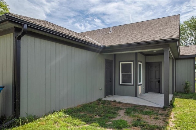 311 S 3rd St, Odessa, MO 64076 - rear view of house with a shingled roof