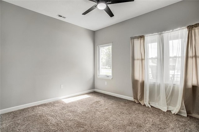 311 S 3rd St, Odessa, MO 64076 - carpeted empty room featuring a ceiling fan and baseboards