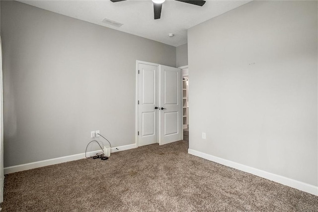 311 S 3rd St, Odessa, MO 64076 - unfurnished bedroom featuring carpet flooring and ceiling fan