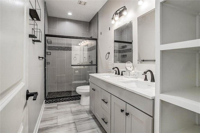 311 S 3rd St, Odessa, MO 64076 - full bath featuring double vanity, a stall shower, and recessed lighting