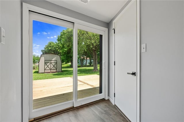812 W Royle St, Richmond, MO 64085 - doorway to outside with wood finished floors