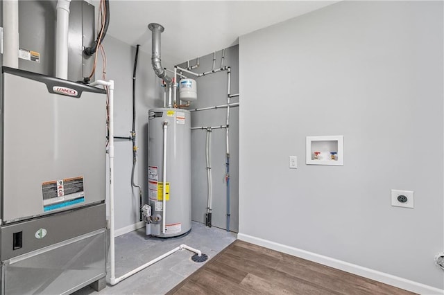 812 W Royle St, Richmond, MO 64085 - utilities with water heater and heating unit