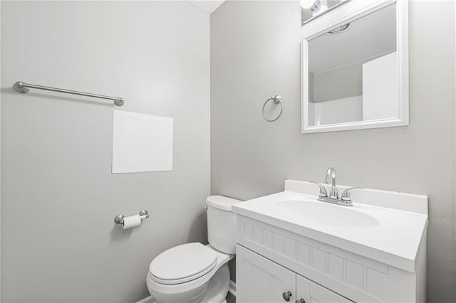 1138 S Willow St, Ottawa, KS 66067 - bathroom with vanity and toilet