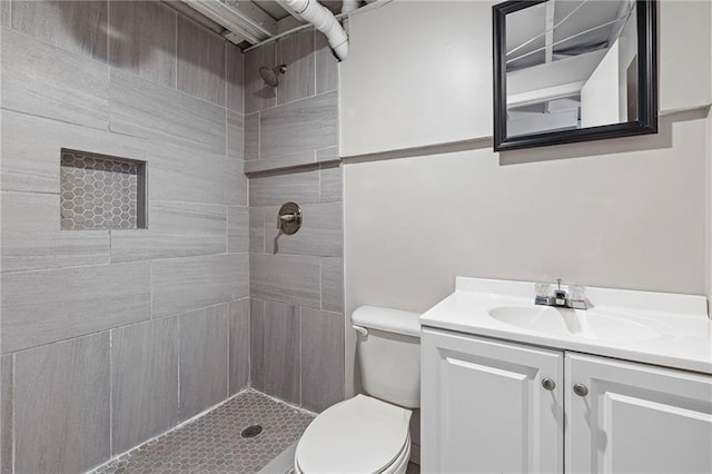 1138 S Willow St, Ottawa, KS 66067 - full bathroom with a tile shower and vanity