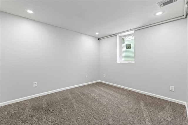 1138 S Willow St, Ottawa, KS 66067 - unfurnished room featuring carpet flooring and recessed lighting