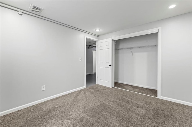 1138 S Willow St, Ottawa, KS 66067 - unfurnished bedroom with carpet floors, recessed lighting, and a closet