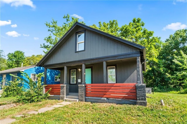 4320 E 43rd St, Kansas City, MO 64130 - view of front of property with a porch