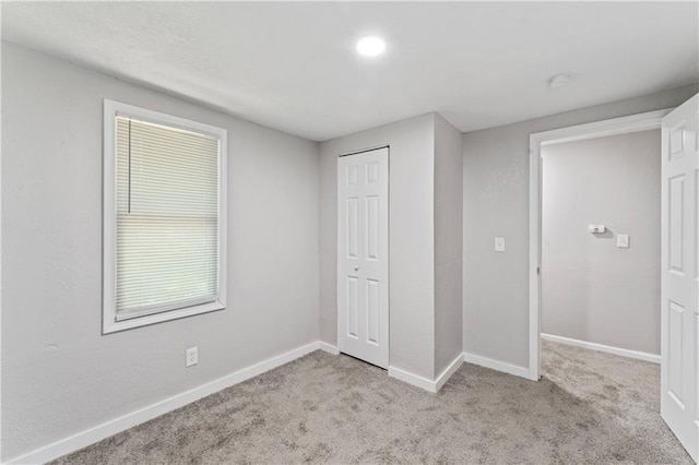 4320 E 43rd St, Kansas City, MO 64130 - unfurnished bedroom with carpet floors and a closet
