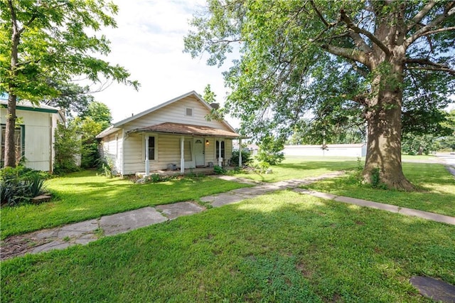 919 Indiana St, Neodesha, KS 66757 - view of front of house with a porch