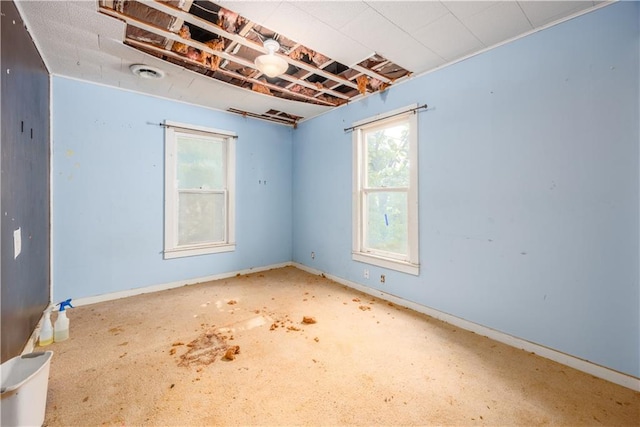 919 Indiana St, Neodesha, KS 66757 - unfurnished room with baseboards