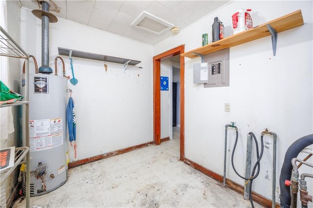 919 Indiana St, Neodesha, KS 66757 - basement with water heater, tile patterned floors, and electric panel