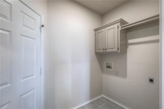 129 SE Chelsea Dr, Lees Summit, MO 64063 - washroom featuring electric dryer hookup, hookup for a washing machine, and cabinet space