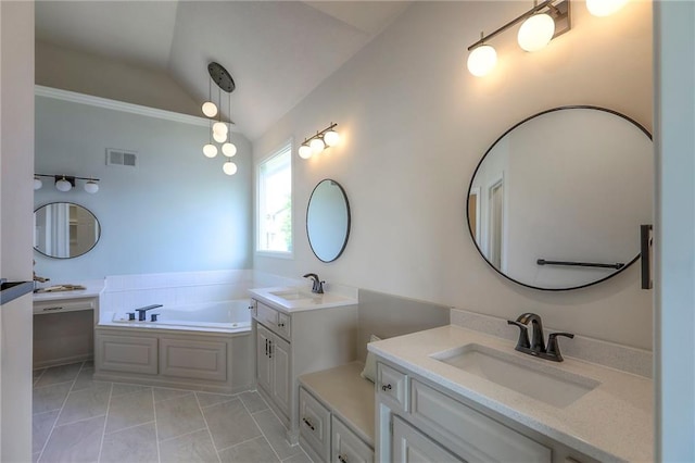 129 SE Chelsea Dr, Lees Summit, MO 64063 - bathroom with vaulted ceiling, two vanities, a bath, and tile patterned flooring