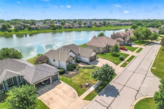 129 SE Chelsea Dr, Lees Summit, MO 64063 - aerial perspective of suburban area featuring a nearby body of water