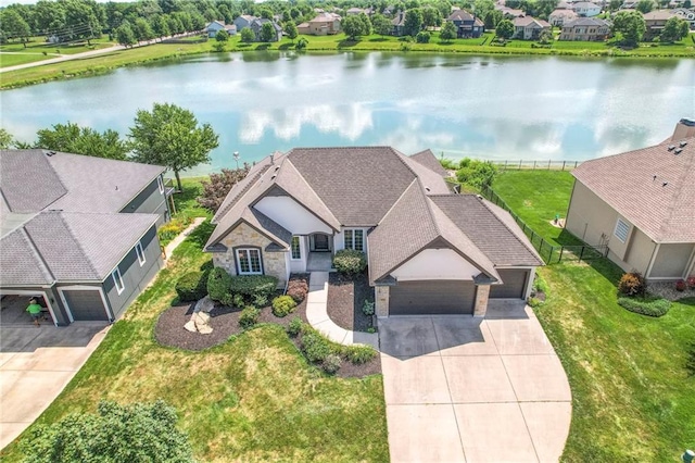 129 SE Chelsea Dr, Lees Summit, MO 64063 - view of subject property with a nearby body of water
