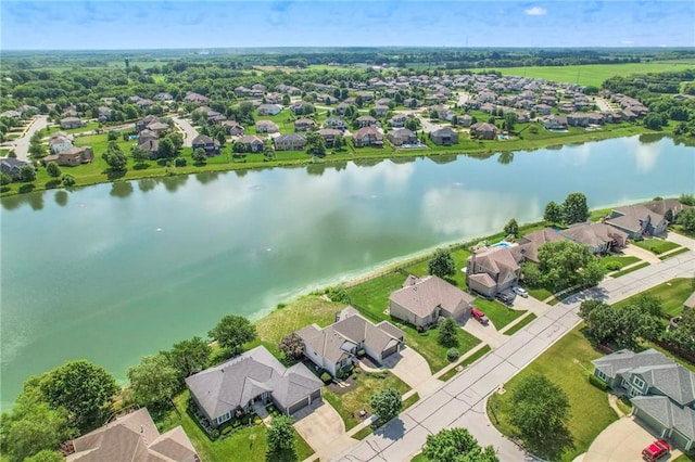 129 SE Chelsea Dr, Lees Summit, MO 64063 - aerial perspective of suburban area featuring a large body of water