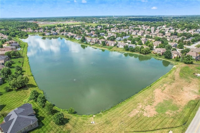 129 SE Chelsea Dr, Lees Summit, MO 64063 - aerial view of residential area featuring a nearby body of water