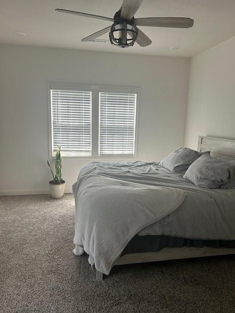 211 Harrison St, Pomona, KS 66076 - carpeted bedroom with a ceiling fan and baseboards