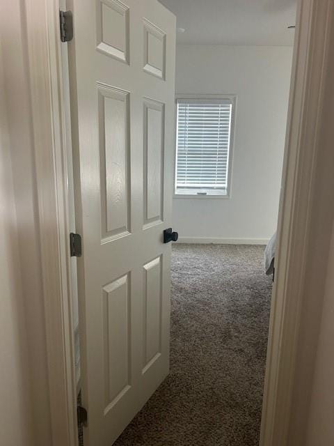 211 Harrison St, Pomona, KS 66076 - hallway with carpet flooring and baseboards