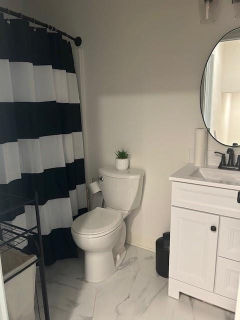 211 Harrison St, Pomona, KS 66076 - full bath with marble finish flooring, vanity, and a shower with shower curtain