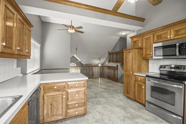 3605 NW Pier Ct, Blue Springs, MO 64015 - kitchen with stainless steel appliances, a ceiling fan, vaulted ceiling, a peninsula, and brown cabinetry