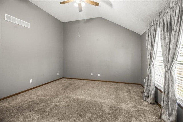 3605 NW Pier Ct, Blue Springs, MO 64015 - spare room with carpet, lofted ceiling, and ceiling fan