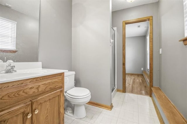 3605 NW Pier Ct, Blue Springs, MO 64015 - full bathroom featuring vanity, a stall shower, and a textured ceiling