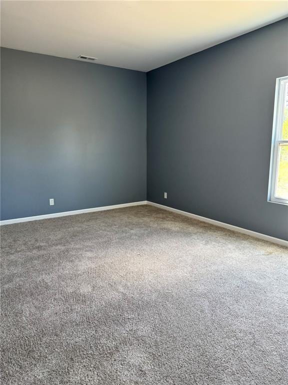 213 Bald Eagle Dr, La Cygne, KS 66040 - empty room with carpet and baseboards