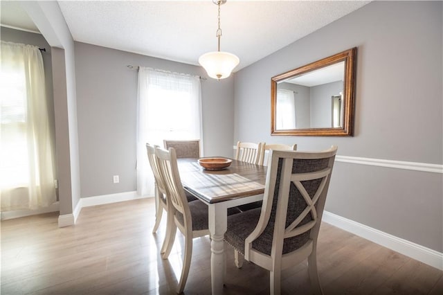 1604 SW 21st St, Blue Springs, MO 64015 - dining room featuring light wood finished floors and baseboards