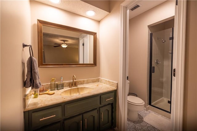1604 SW 21st St, Blue Springs, MO 64015 - full bath featuring a stall shower, vanity, ceiling fan, and tile patterned floors