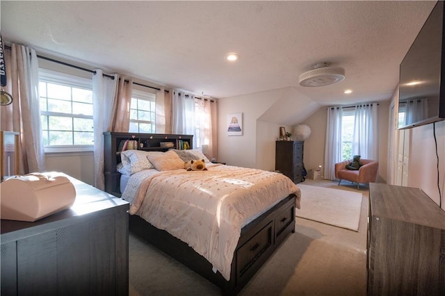 1604 SW 21st St, Blue Springs, MO 64015 - bedroom featuring multiple windows, recessed lighting, and a textured ceiling