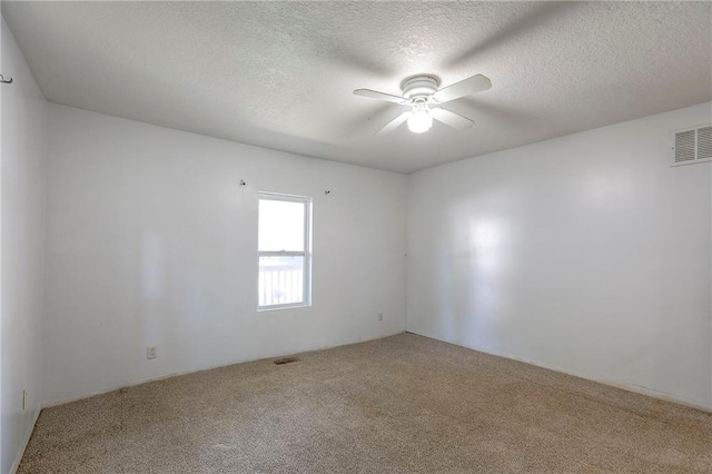 934 Williams St, Excelsior Springs, MO 64024 - carpeted empty room featuring a ceiling fan and a textured ceiling